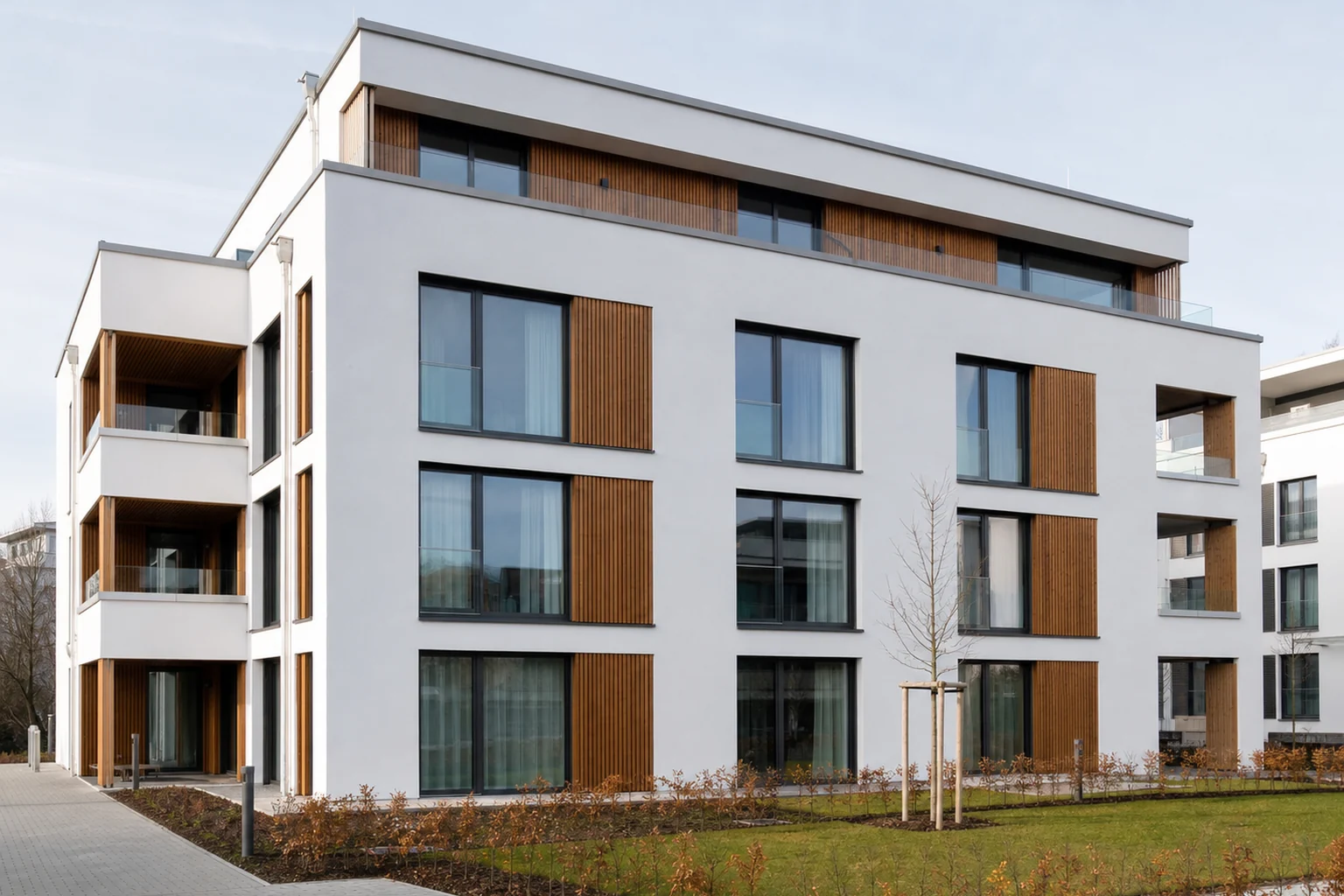 German passive house apartment project with triple-glazed aluminum windows supplied through a European OEM distributor